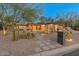 Charming single-story home featuring a well-maintained xeriscaped front yard and two-car garage at 5507 N Calle Del Santo --, Phoenix, AZ 85018