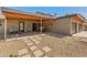 Covered patio with desert landscaping, neutral tones, and a dining and lounge area at 5507 N Calle Del Santo --, Phoenix, AZ 85018