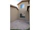 Enclosed patio with stone and grass, a perfect backyard retreat at 559 E Rainbow Dr, Chandler, AZ 85249