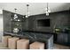 Modern bar area featuring a black marble countertop, and unique globe lighting at 6216 N 38Th Pl, Paradise Valley, AZ 85253