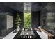 Unique bathroom with black marble tub, pendant lighting, and views of the outdoors at 6216 N 38Th Pl, Paradise Valley, AZ 85253