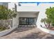 Grand entrance with geometric tile detail, manicured landscaping, and a modern facade at 6216 N 38Th Pl, Paradise Valley, AZ 85253