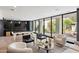 Bright game room and bar area with ample seating and great views of the yard at 6216 N 38Th Pl, Paradise Valley, AZ 85253
