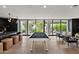 Open game room featuring a pool table, bar area, and outdoor views at 6216 N 38Th Pl, Paradise Valley, AZ 85253