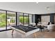 Bright game room with pool table and large sliding doors to outdoor scenery at 6216 N 38Th Pl, Paradise Valley, AZ 85253