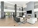 Open-concept living room showcasing soaring ceilings, a modern fireplace, and seamless indoor-outdoor living at 6216 N 38Th Pl, Paradise Valley, AZ 85253