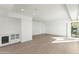 Bright and airy living room with hardwood floors, recessed lighting, and a modern wine fridge at 6216 N 38Th Pl, Paradise Valley, AZ 85253