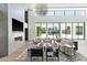 Spacious living room with high ceilings, a modern fireplace, and floor-to-ceiling windows at 6216 N 38Th Pl, Paradise Valley, AZ 85253