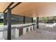 A covered outdoor kitchen offers a spacious counter and an integrated grill, perfect for year-round entertaining at 6216 N 38Th Pl, Paradise Valley, AZ 85253