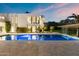 Luxury backyard featuring a long pool and elegant design features at 6216 N 38Th Pl, Paradise Valley, AZ 85253