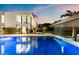 Stunning pool reflects the home's contemporary architecture, lush landscaping, and serene outdoor space at 6216 N 38Th Pl, Paradise Valley, AZ 85253