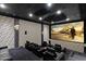 Well-appointed theater room boasts reclining seating and a large screen for movie viewing at 6216 N 38Th Pl, Paradise Valley, AZ 85253