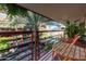 Relaxing balcony space with a view of lush landscaping and courtyard at 7137 E Rancho Vista Dr # 3003, Scottsdale, AZ 85251