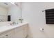 Bright bathroom featuring white vanity with sink, large mirror, and towel bar at 7137 E Rancho Vista Dr # 3003, Scottsdale, AZ 85251