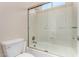 Bathroom features a shower with a glass sliding door at 7630 E Knoll St, Mesa, AZ 85207