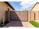 Gated driveway featuring additional parking and security at 7630 E Knoll St, Mesa, AZ 85207