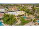 Aerial view showing a yellow home with a pool and desert landscaping at 7719 W Bluefield Ave, Glendale, AZ 85308