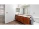 Bright primary bathroom with double sink vanity and tile flooring at 8527 E Lindner Ave, Mesa, AZ 85209