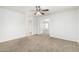 Open bedroom featuring neutral carpet and natural light at 8527 E Lindner Ave, Mesa, AZ 85209