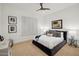 Cozy bedroom featuring neutral decor, shuttered windows, and plush bedding at 8832 E Wethersfield Rd, Scottsdale, AZ 85260