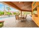 Outdoor dining space overlooking the pool, with desert landscaping at 8924 E Charter Oak Dr, Scottsdale, AZ 85260