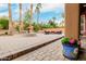 Spacious backyard featuring a fountain, firepit, and lush landscaping, perfect for outdoor living at 8924 E Charter Oak Dr, Scottsdale, AZ 85260