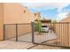 Gated driveway providing extra security with carport at 8924 E Charter Oak Dr, Scottsdale, AZ 85260