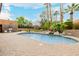 Inviting pool area with an outdoor kitchen, perfect for entertaining and relaxation at 8924 E Charter Oak Dr, Scottsdale, AZ 85260