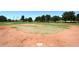 Outdoor baseball field with the pitcher's mound and home plate visible at 9012 E Sutton Dr, Scottsdale, AZ 85260