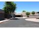 View of the community building with brick accents, a covered entrance and attractive landscaping at 9012 E Sutton Dr, Scottsdale, AZ 85260