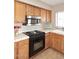 A close-up of a modern kitchen area featuring stainless appliances and white countertops at 9012 E Sutton Dr, Scottsdale, AZ 85260