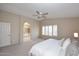 Spacious main bedroom with ensuite bathroom and plantation shutters bringing lots of natural light at 9012 E Sutton Dr, Scottsdale, AZ 85260