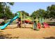 Vibrant playground equipment, including slides and climbing structures, providing fun for children at 9012 E Sutton Dr, Scottsdale, AZ 85260