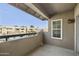 Outdoor patio featuring concrete flooring, a complex view, and a glimpse of the pool at 9450 E Becker Ln # 2090, Scottsdale, AZ 85260