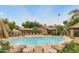 Beautiful community pool with lounging, grilling, and a view of the community buildings at 9450 E Becker Ln # 2090, Scottsdale, AZ 85260