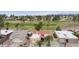 Aerial view of a community with well-maintained houses near a golf course at 9576 E Fairway Blvd, Sun Lakes, AZ 85248