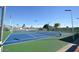 Outdoor tennis courts offer residents the chance to engage in friendly competition and active recreation at 9576 E Fairway Blvd, Sun Lakes, AZ 85248