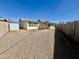 Gravel backyard features a covered patio area for outdoor enjoyment and a shed at 1001 W 17Th St, Tempe, AZ 85281