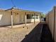 Backyard has covered patio, gravel and fence at 1001 W 17Th St, Tempe, AZ 85281