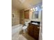 Updated bathroom featuring tiled shower, new vanity, and modern lighting at 1001 W 17Th St, Tempe, AZ 85281
