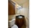 Updated bathroom featuring new vanity with dark countertop and modern lighting at 1001 W 17Th St, Tempe, AZ 85281