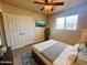 Serene bedroom with a queen bed, plush bedding, and a bright window view at 1001 W 17Th St, Tempe, AZ 85281