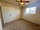 Carpeted bedroom featuring double closets and a window at 1001 W 17Th St, Tempe, AZ 85281