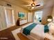 Inviting bedroom with soft lighting, comfortable king bed, and a view into living area at 1001 W 17Th St, Tempe, AZ 85281