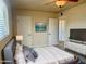 Bright bedroom featuring modern furnishings, a comfortable queen bed, and ample closet space at 1001 W 17Th St, Tempe, AZ 85281