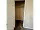 Carpeted bedroom closet with open door at 1001 W 17Th St, Tempe, AZ 85281
