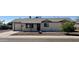 Inviting one-story home boasts a tidy yard, and a freshly painted exterior, creating a welcoming curb appeal at 1001 W 17Th St, Tempe, AZ 85281