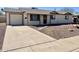 Well-maintained single-Gathering house featuring a driveway and nicely landscaped front yard at 1001 W 17Th St, Tempe, AZ 85281