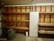 Garage storage with shelving, and side door at 1001 W 17Th St, Tempe, AZ 85281