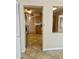 View of the kitchen from doorway with granite countertops and stainless steel appliances at 1001 W 17Th St, Tempe, AZ 85281